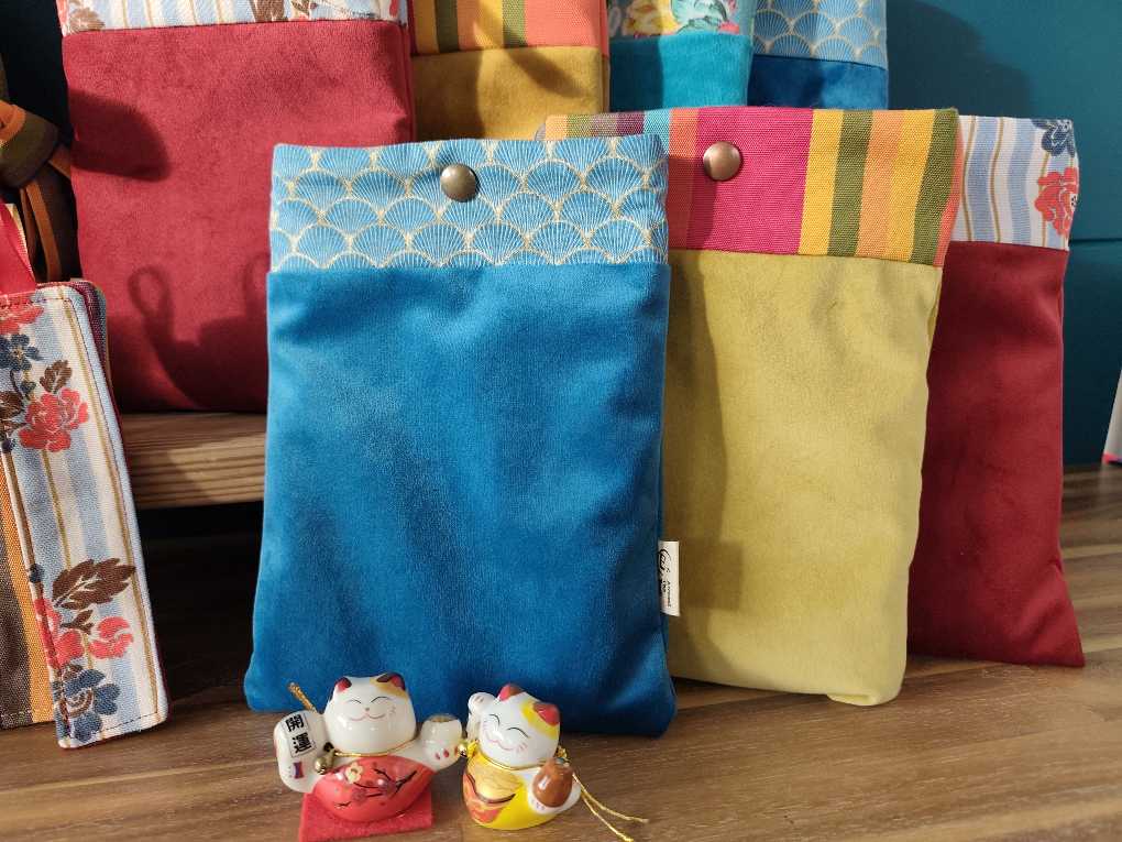 Les Pochettes pour Livre à Bouton pression